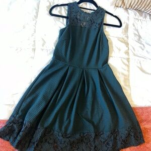 Beautiful dark green dress with lace detail